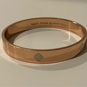 Kate spade rose gold circle bangle with cream spade logo classic jewelry 1 size